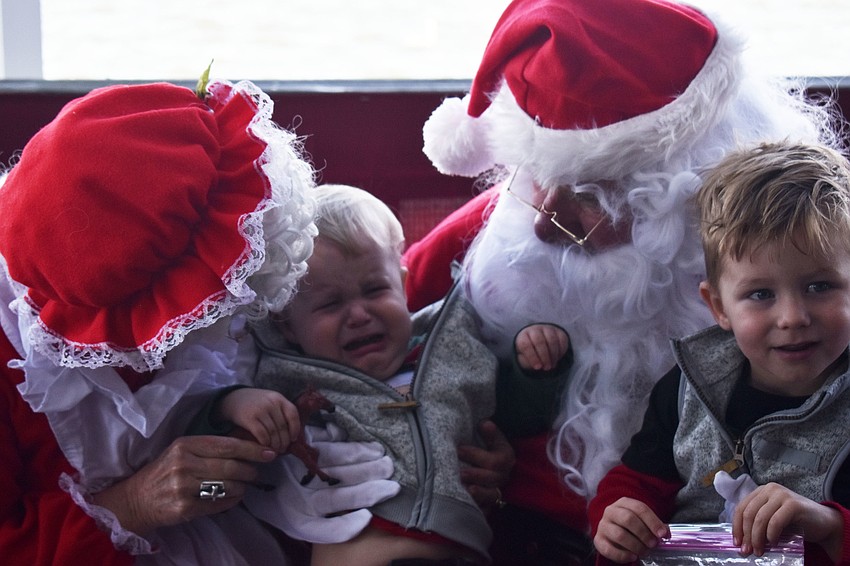 Weston and Bennett Rapihana had mixed feelings about seeing Santa and Mrs. Claus.