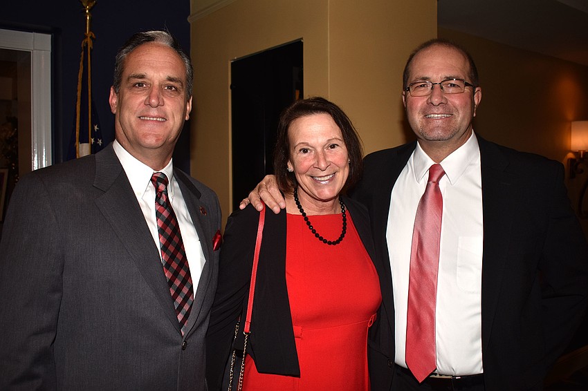 Longboat Key Fire Rescue Chief Dezzi and Dee and Tom Harmer, incoming Longboat Key town manager.