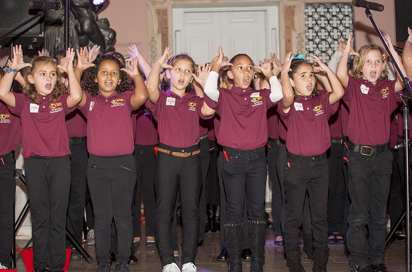 The Bashaw Elementary School chorus performs at the The Ringling Holiday Splendor event.