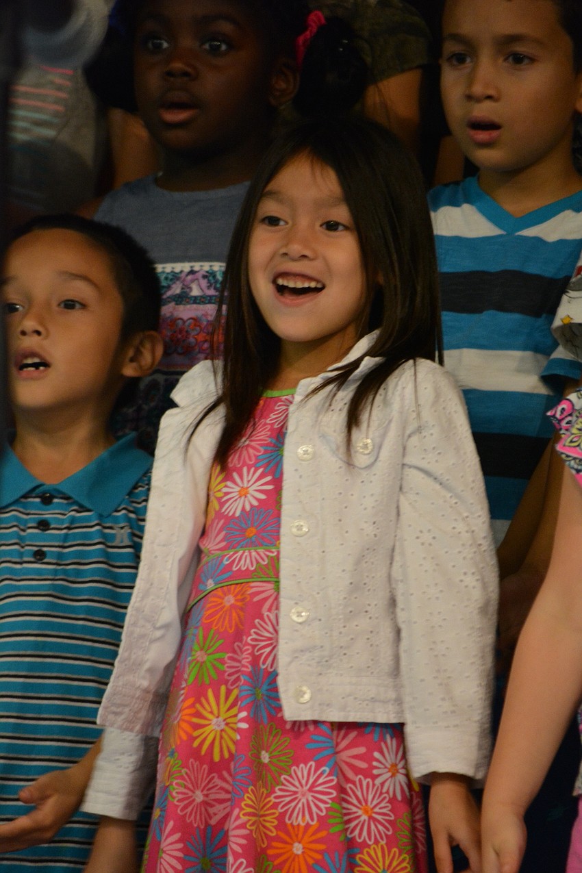 Danika Phan cannot stop smiling as she performs.