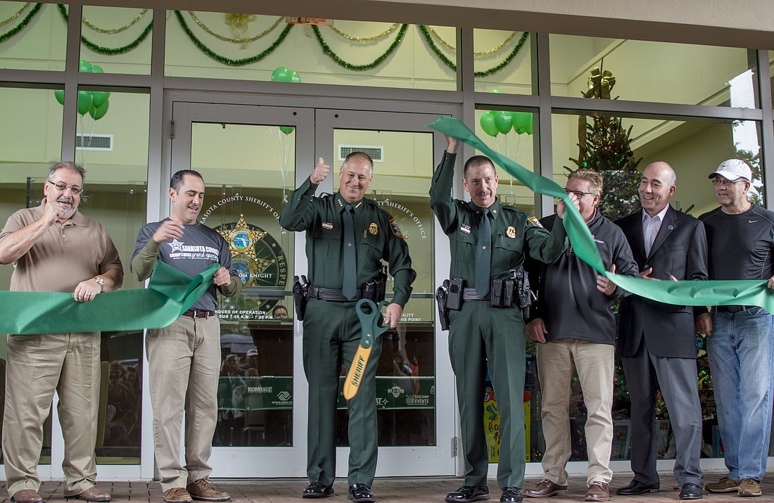 Sarasota County Sheriff Tom Knight cuts the ribbon on the agency&#39;s new facility.