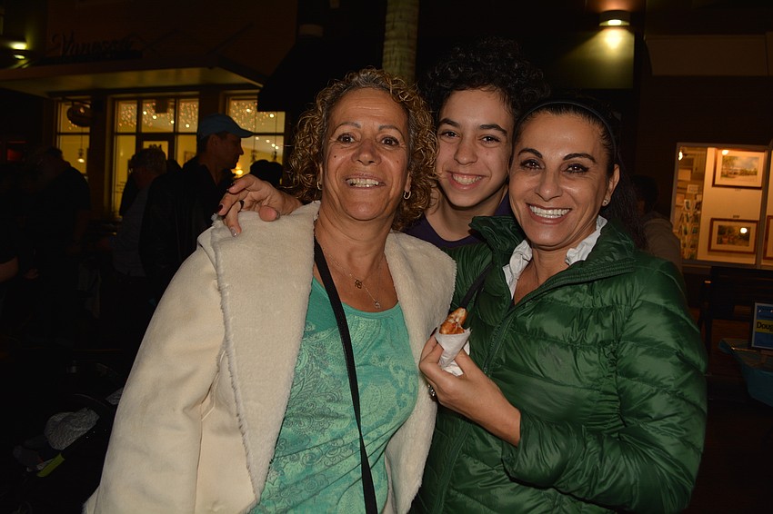 Shosh Nadel and Gaya Nadel, of Sarasota, and Eti Farber, of Siesta Key, enjoy the festivities.