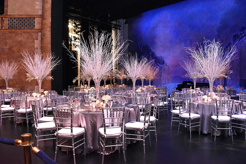 The Sarasota Opera House stage was adorned with winter decor for the annual dinner.