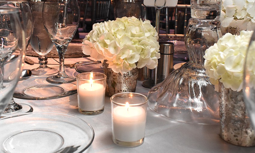 The Sarasota Opera House stage was adorned with winter decor for the annual dinner.