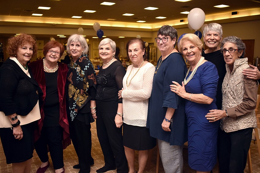 Temple volunteers organized the annual dinner, which included brisket and latkes with applesauce.