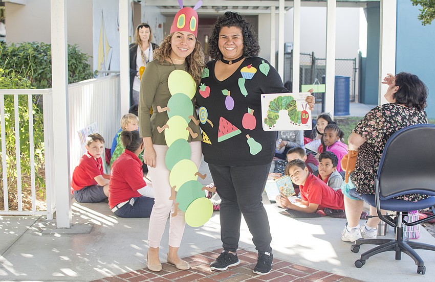 Teachers Iliana Garcia and Maria Orduno dress up for Alta Vista's Reading Street event.