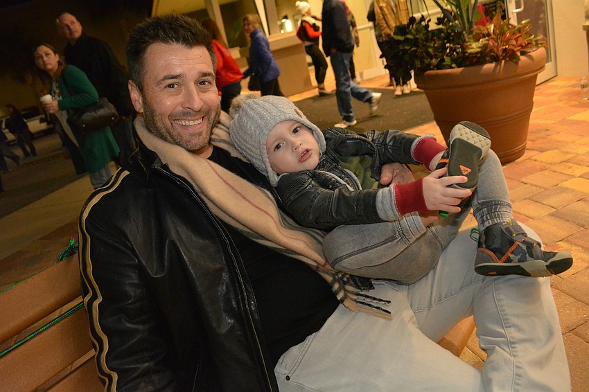 Mike and Rocco Potillo, of East County, take a rest after walking the town of Bethlehem.