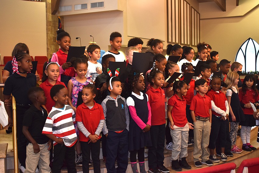 Students from the 13th Avenue Dream School performed “Little Drummer Boy” and “Joy to the World.”
