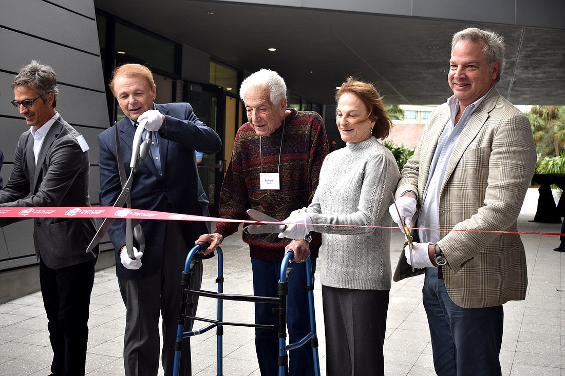 Jerry Sparkman, Ringling College of Art and Design President Larry Thompson, Richard and Barbara Basch and Board of Trustees Chairman Dean Eisner open the new visual arts center. Photo by Katie Johns
