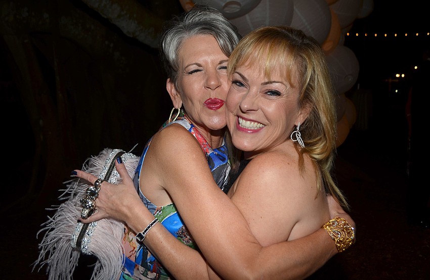 Sally Schule and Susan Malloy Jones at Orchid Ball on Feb. 11.