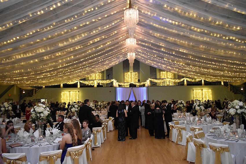 The Sarasota Municipal Auditorium was transformed into a dazzling ballroom complete with chandeliers.