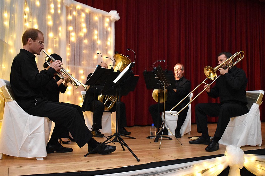 A Sarasota Orchestra quintet performs before the ceremony.