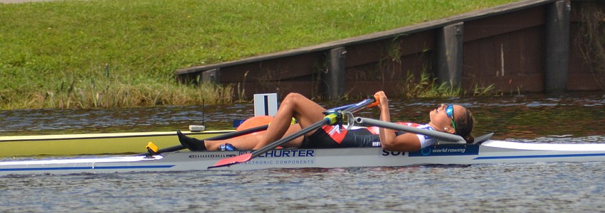 Switzerland's Patricia Merz collapses in agony after her  fourth-place finish in the Lightweight Women's Single Sculls during the 2017 World Rowing Championships in September.