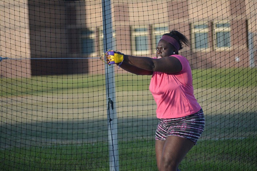 Nov. 2: Booker High junior Nikki Marceus practices her hammer throw. She took a year and a half away from the sport before picking it back up in pursuit of a scholarship.