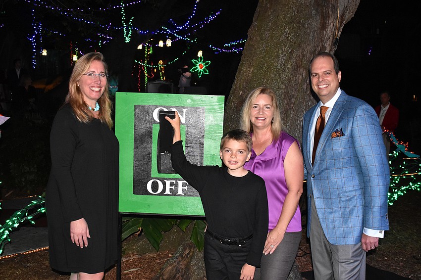 Selby President and CEO Jennifer Rominiecki with Hays, Mike and Jena Wilson