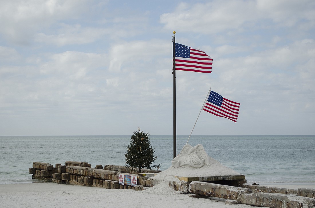 The sculpture sits on the pier at Beach Access 2, along with a Christmas tree and a new 22-foot flagpole.