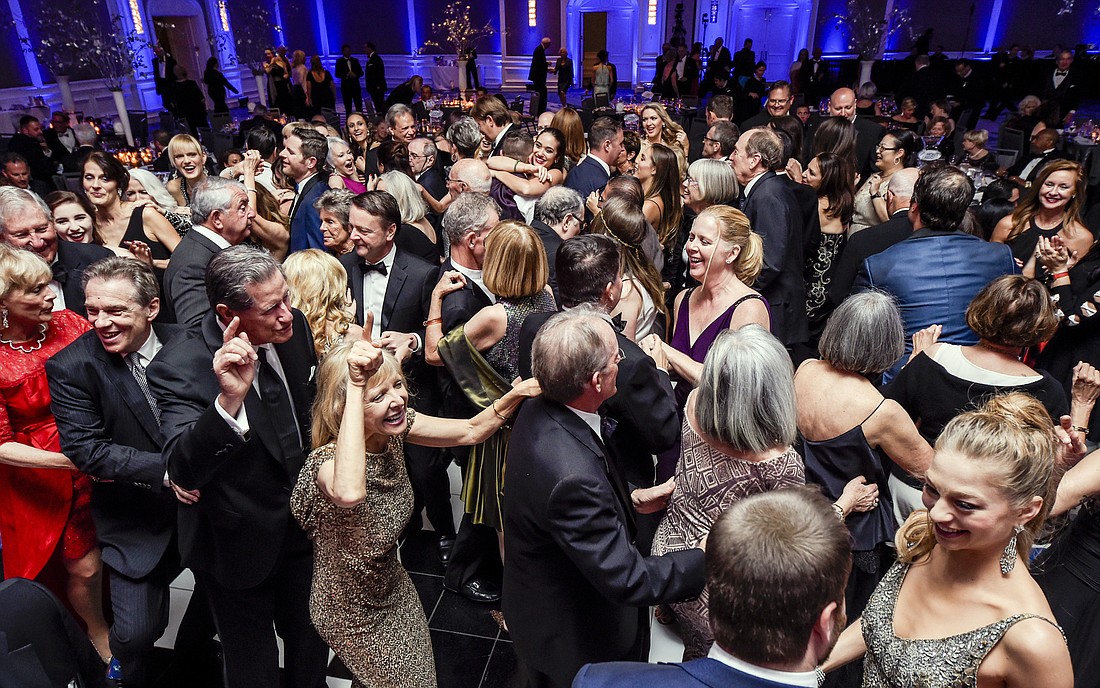 Guests take to the dance floor at Asolo Rep Gala 2017. Photo by Cliff Roles