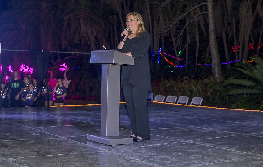 Selby CEO Jennifer Rominiecki welcomes guests to the special viewing of Selby Lights in Bloom.