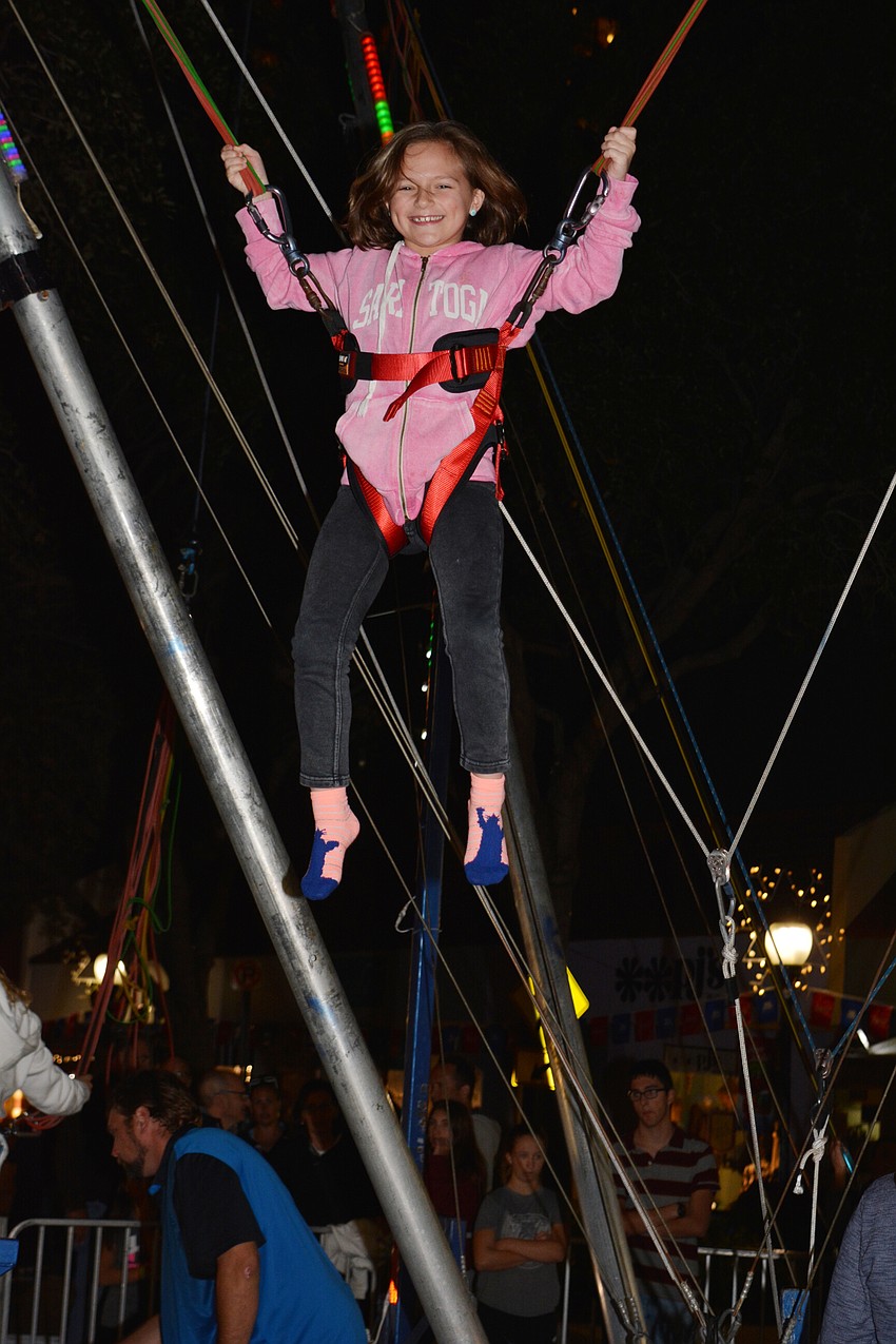 Sydney Rosen bounces during the celebration.