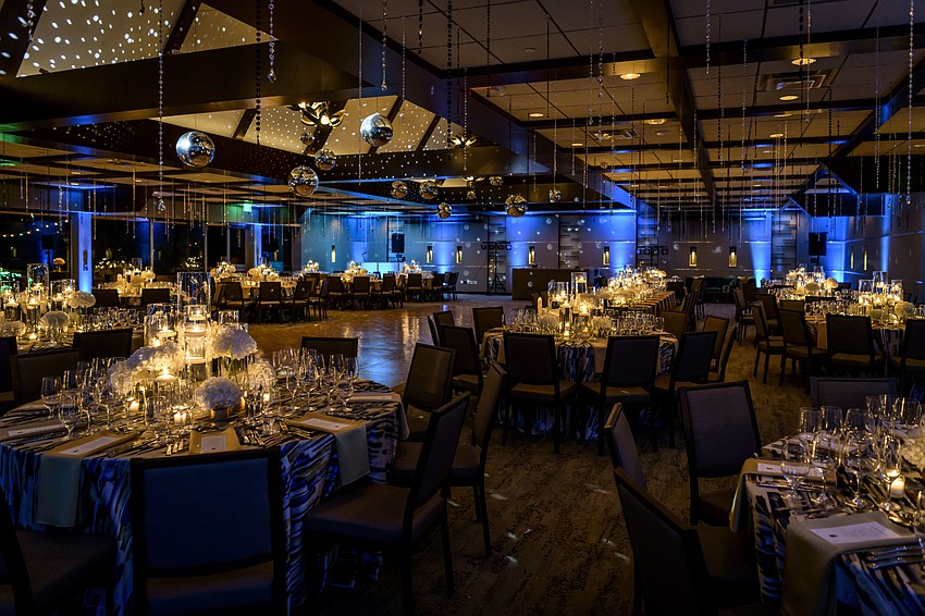 Lighting and Ceiling Decor: Affairs in the Air, Inc.; Centerpieces: Flowers by Fudgie;  Linens: BBJ Linen;   Catering: Philip Mancini and Michael's