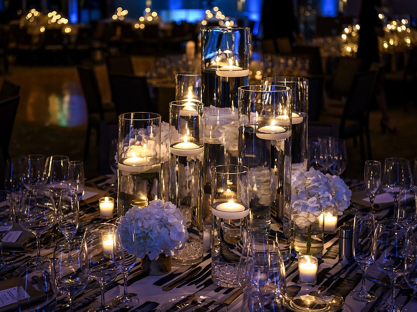 Lighting and Ceiling Decor: Affairs in the Air, Inc.; Centerpieces: Flowers by Fudgie;  Linens: BBJ Linen;   Catering: Philip Mancini and Michael's