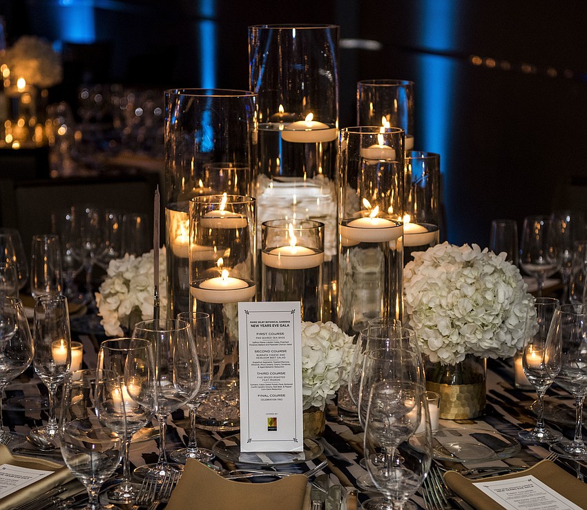 Lighting and Ceiling Decor: Affairs in the Air, Inc.; Centerpieces: Flowers by Fudgie;  Linens: BBJ Linen;   Catering: Philip Mancini and Michael's