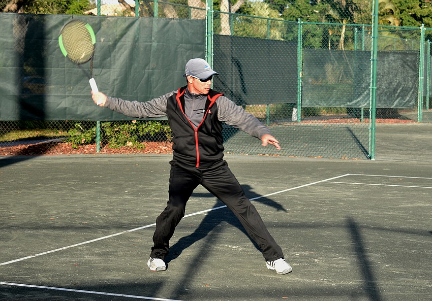 Claudiu Retean plays in an exhibition game during the cocktail party.