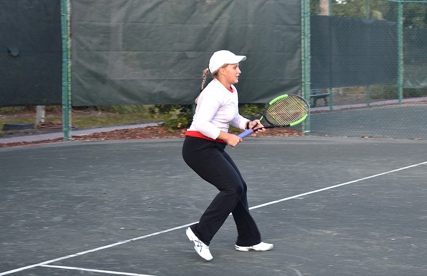 Sandra Weib plays in an exhibition game during the cocktail party.