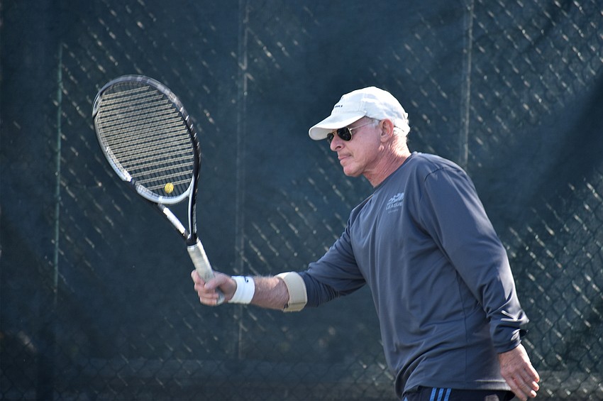 Mark Rosenfeld hits the ball during a preliminary match.
