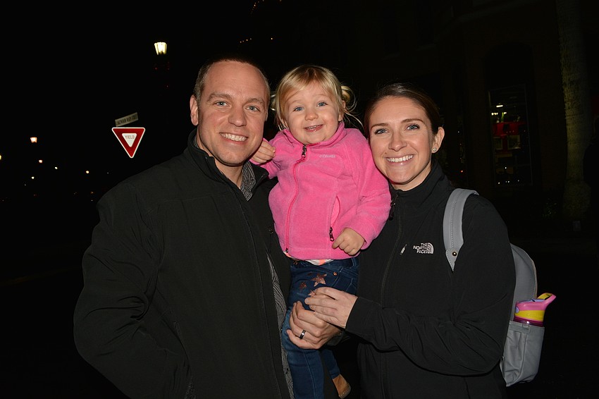 Brandon, Sydney and Jennifer Cross, of Lakewood Ranch, say it's cold, but not enough to keep them from attending.