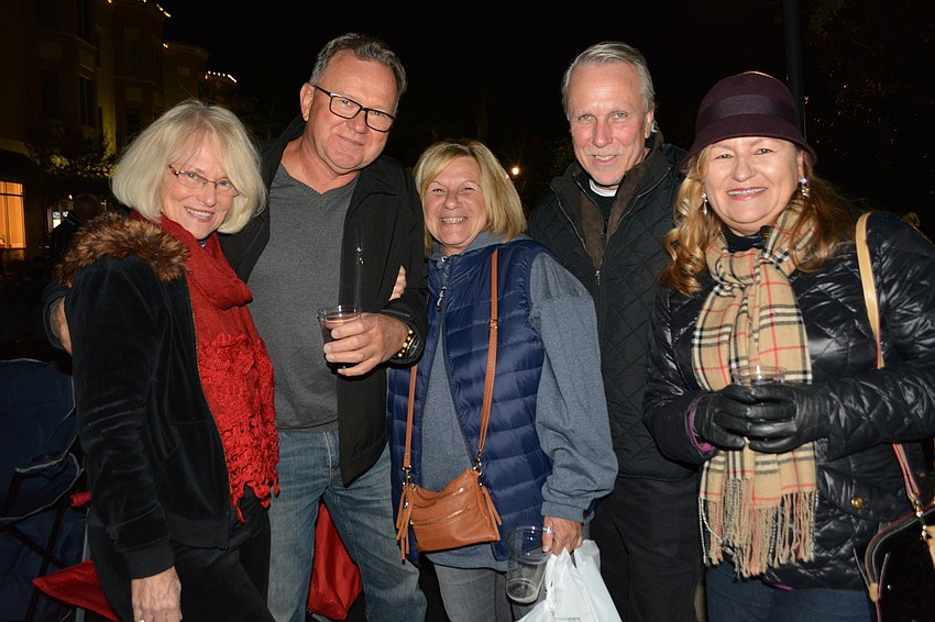 Neighbors Julia Whitlock, Walter Kochman, Doreen Dooney, Jeff Dooney and Donna Kochman, of Sarasota, come together.