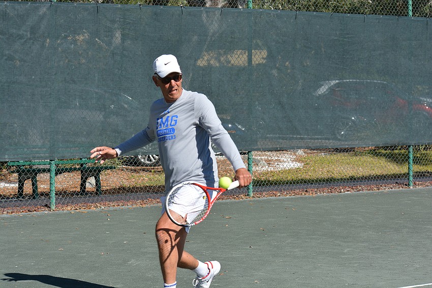 Ron Plashkes backhands a return.