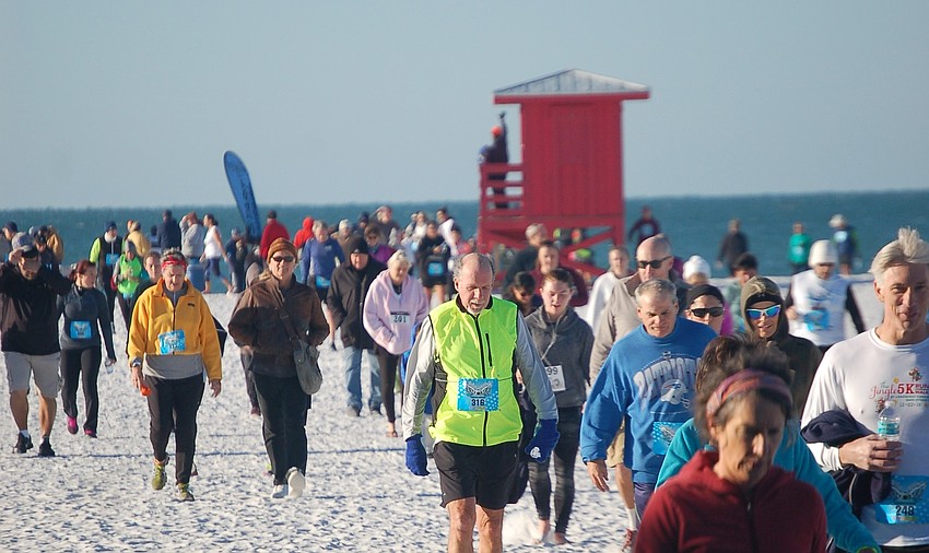 Participants and supporters head back to the pavilion area for the awards ceremony.