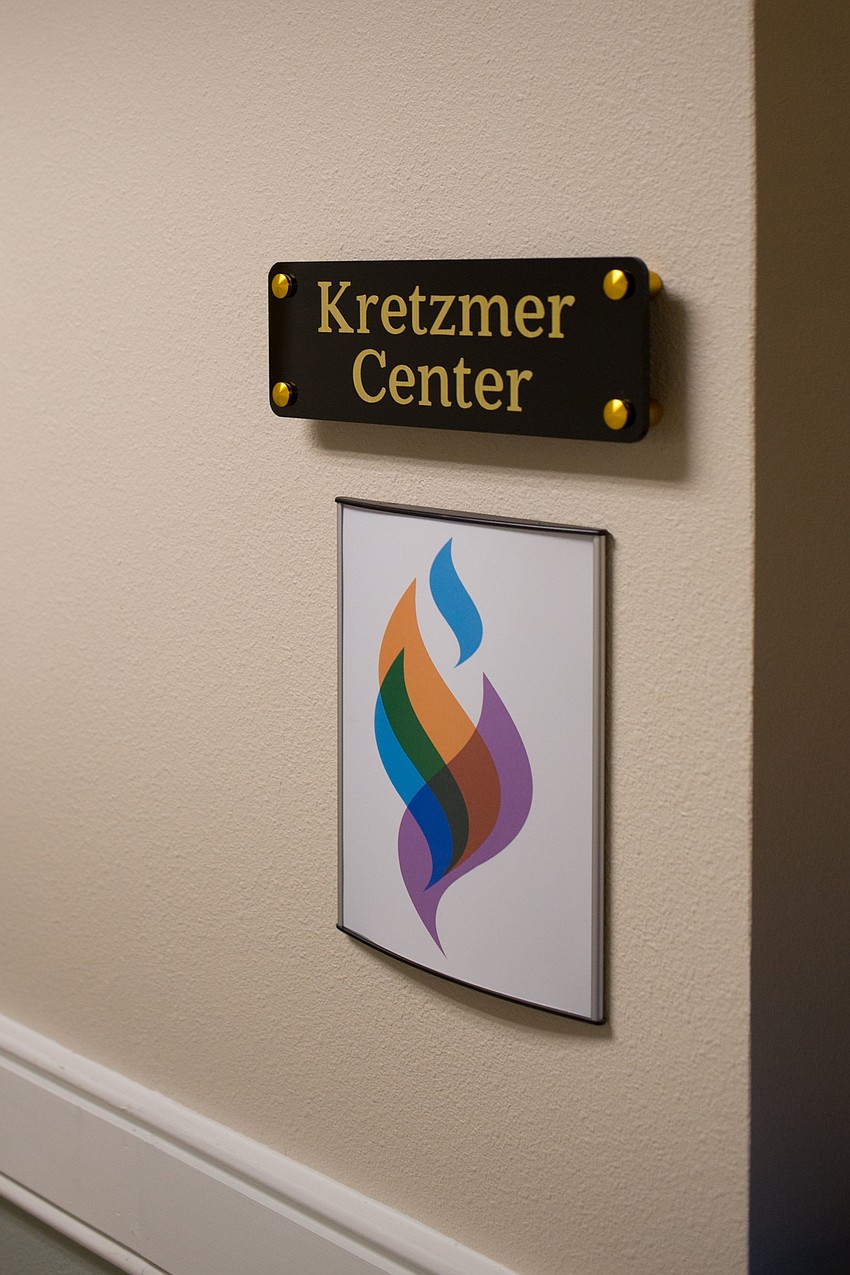 Inside the center in the event room where dinner was held has three double doorways for easy access in and out of the room.