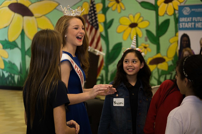 Maddy Boehm, Miss Florida Junior High, talks with Boys & Girls Club Member Ambassadors before the presentation.