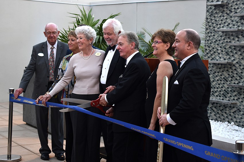 President and CEO of Plymouth Harbor Harry Hobson along with fellow chairpeople and board members cut the ribbon of the new Northwest Garden Building.