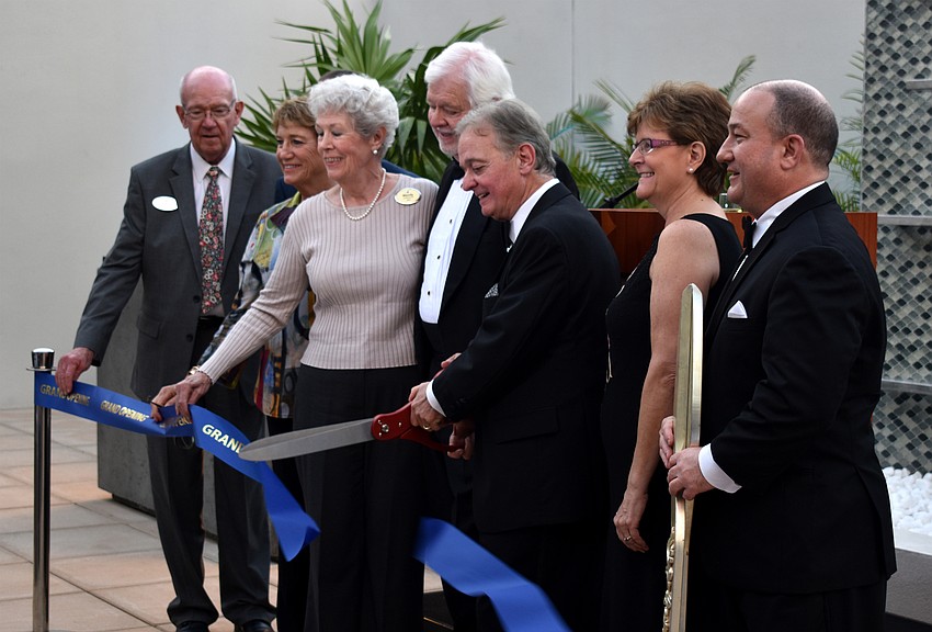 President and CEO of Plymouth Harbor Harry Hobson along with fellow chairpeople and board members cut the ribbon of the new Northwest Garden Building.