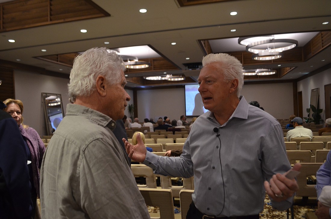 A.G. Lafley, right, discusses the bayfront planning effort at an event at The Francis on Monday.