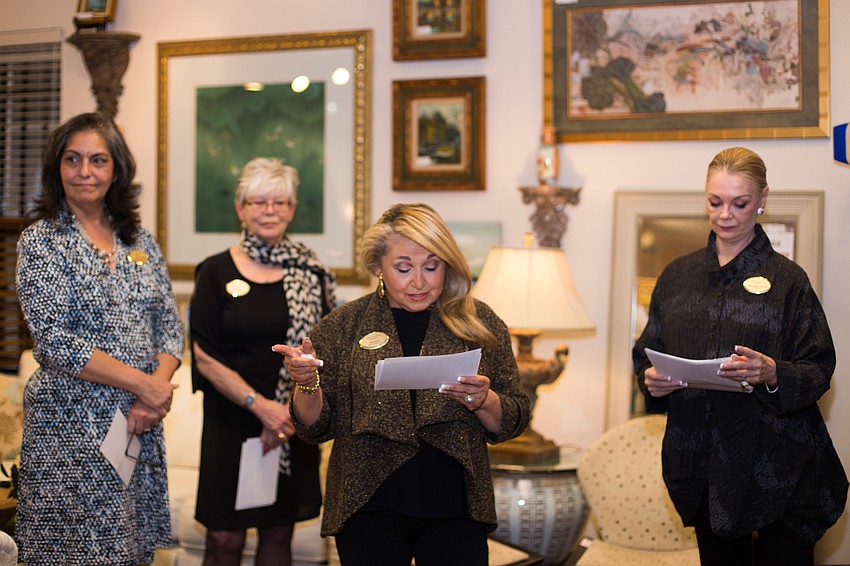 Ida Zito, Designing Women Boutique Board President, gives an opening speech.