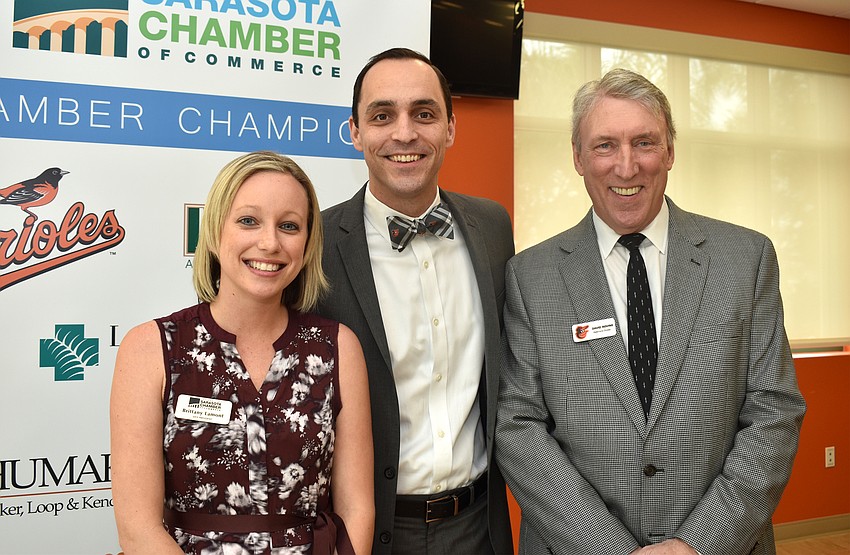 Sarasota Chamber of Commerce Vice President Brittany Lamont, Chamber President Kevin Cooper and Vice President of Orioles-Sarasota David Rovine