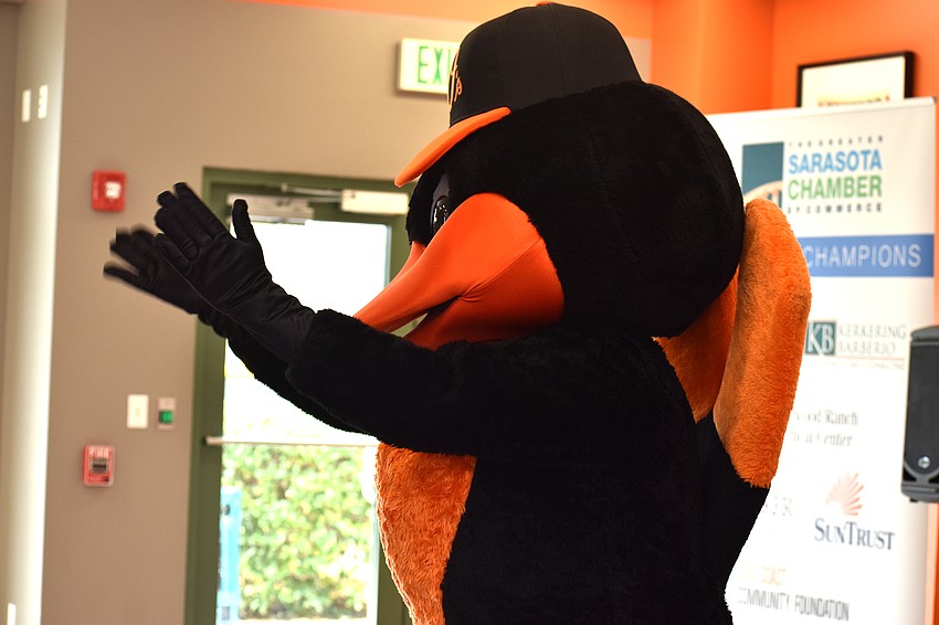 The Oriole Bird works for a round of applause from the crowd after he’s introduced.