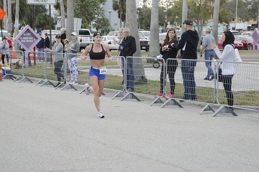 Kelli Jaco was the first female runner to cross the finish line.