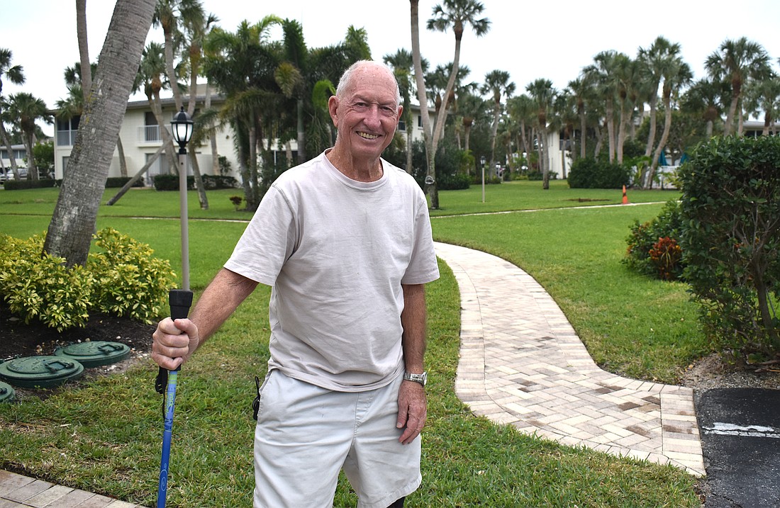 Warren Roberts, a retired professor, walks the beach every day.