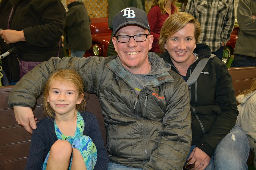 St. Petersburg residents Avery, Adam and Nicole Kersey  are eager to see the corn dog eating contest.
