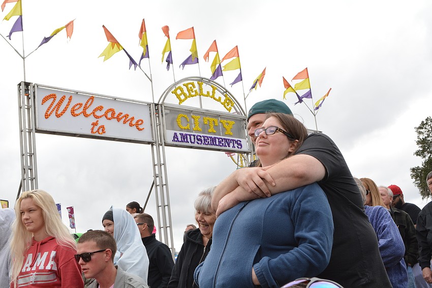 Bradenton's Emily Nablo and Joe Hansen  are ready to watch pig racing.
