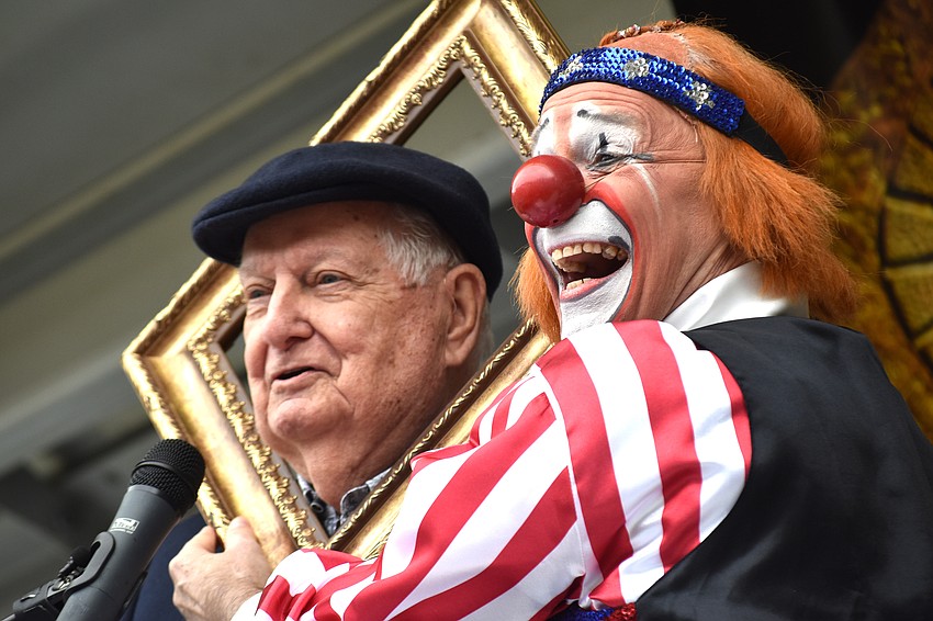 Inductee Chuck “Chucko” Sidlow laughs with sponsor Al Van Tiegham.