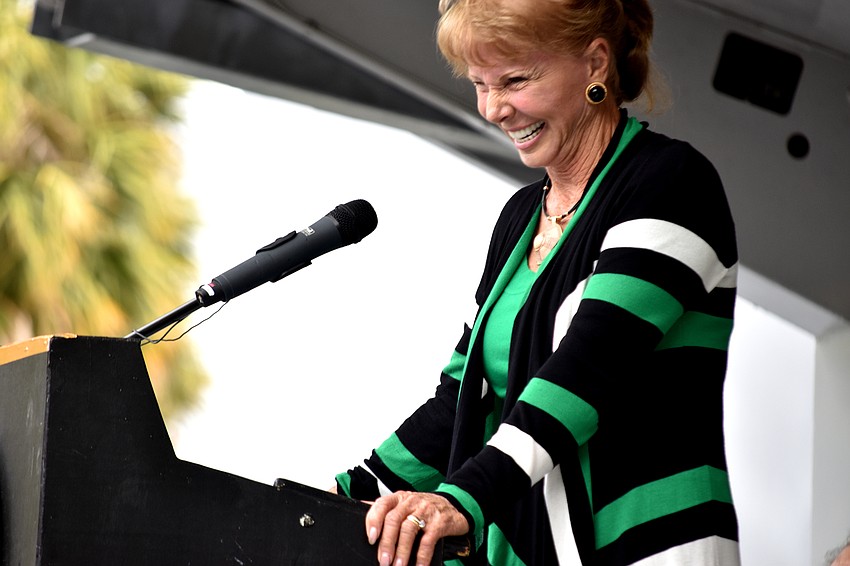 Ilona Fullgrap, part of inductee group The Fredonias, laughs with the crowd.