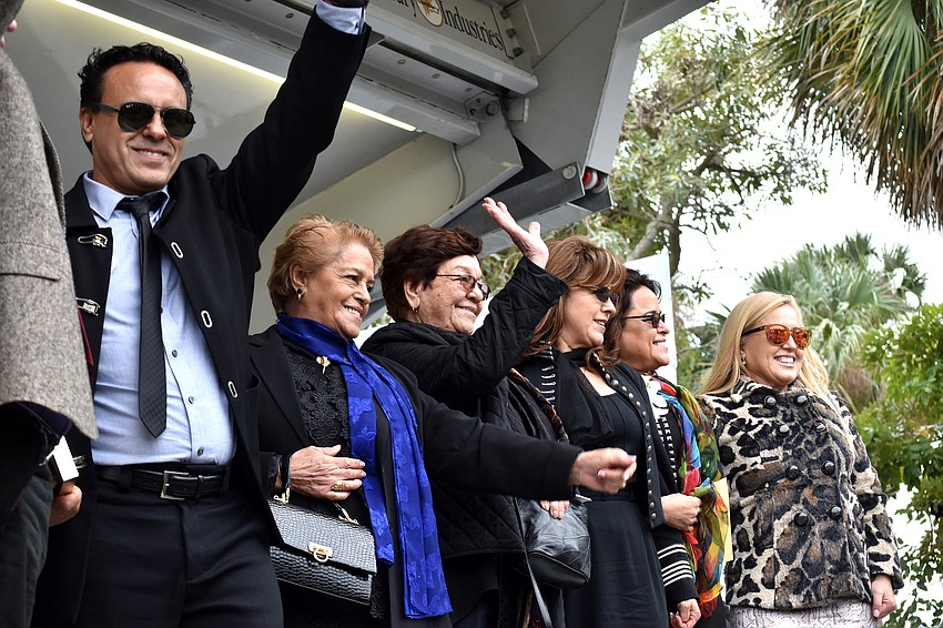 The Flying Espanas wave to the crowd following their induction.