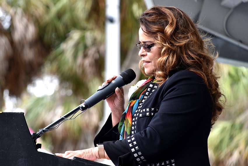 Carolina Espana Nock speaks to the crowd about The Flying Espanas.