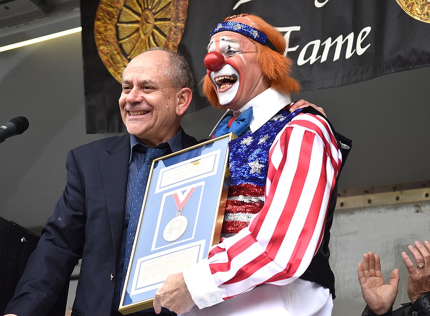 Master of Ceremonies Barry Lubin and Chuck “Chucko” Sidlow are all smiles during the induction ceremony.